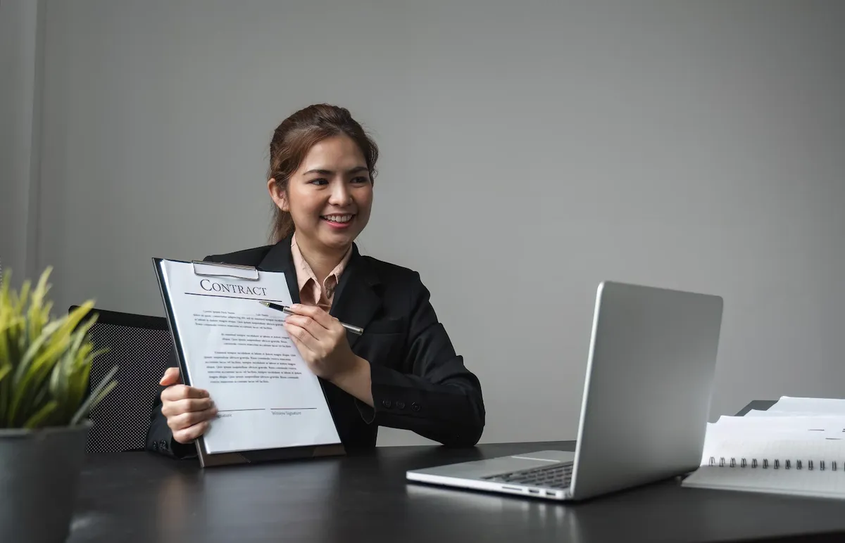 Recruitment consultant presenting a contract